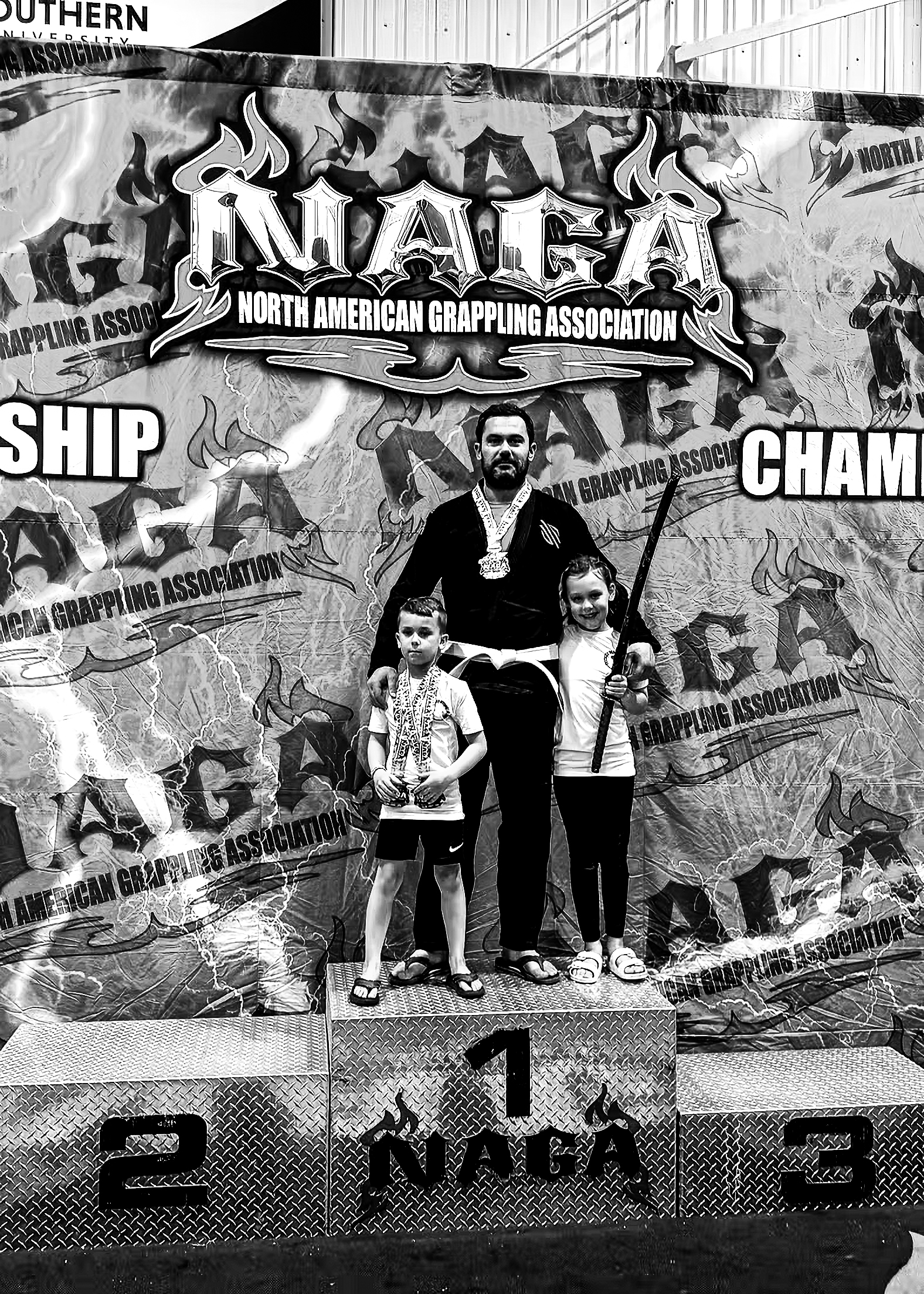 Andy Roberts with kids at NAGA championship